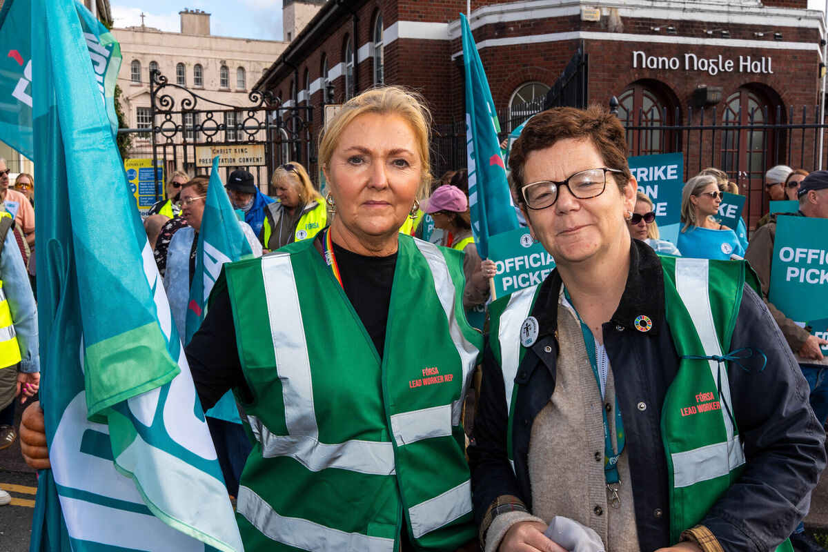 Victoria Luke, school secretary from St Mary's School in Rochestown, and Noreen O'Callaghan, Watergrasshill NS and secretary of the school branch of Fórsa, who formed part of the protest that marched from Nano Nagle school in Turners Cross to An Taoiseach's constituency office. Victoria Luke, school secretary from St Mary's School in Rochestown, and Noreen O'Callaghan, Watergrasshill NS and secretary of the school branch of Fórsa, who formed part of the protest that marched from Nano Nagle school in Turners Cross to An Taoiseach's constituency office.