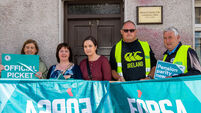Striking school secretaries and caretakers hold protest outside Taoiseach’s Cork office