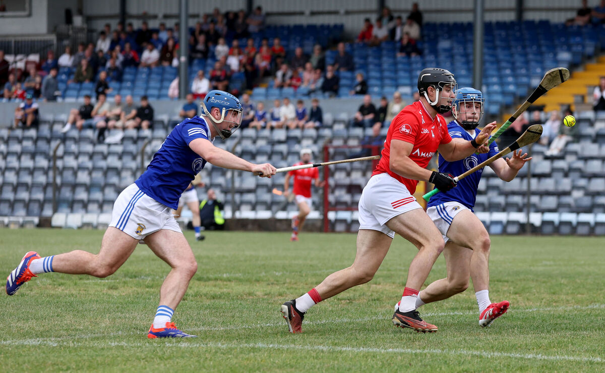  Kevin Maguire and Darragh O'Sullivan, Ballinhassig, tackling Joe Stack, Castlemartyr. Picture: Jim Coughlan.