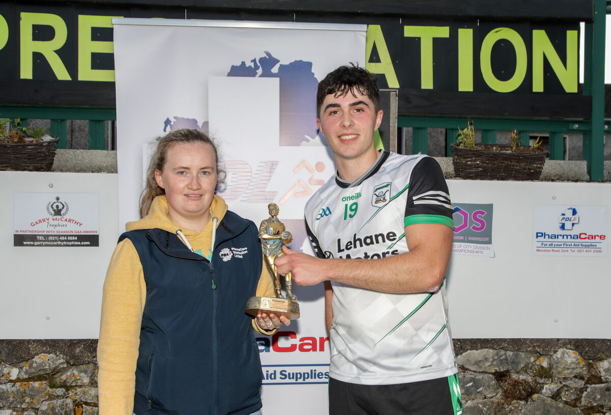Megan Farr of Pharma Care presents the Man of the Match award to Seán Coakley. Picture: David Creedon Megan Farr of Pharma Care presents the Man of the Match award to Seán Coakley. Picture: David Creedon