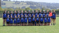 Sarsfields survive a stern Eire Og test to make it back to back wins in the SE Systems senior camogie championship