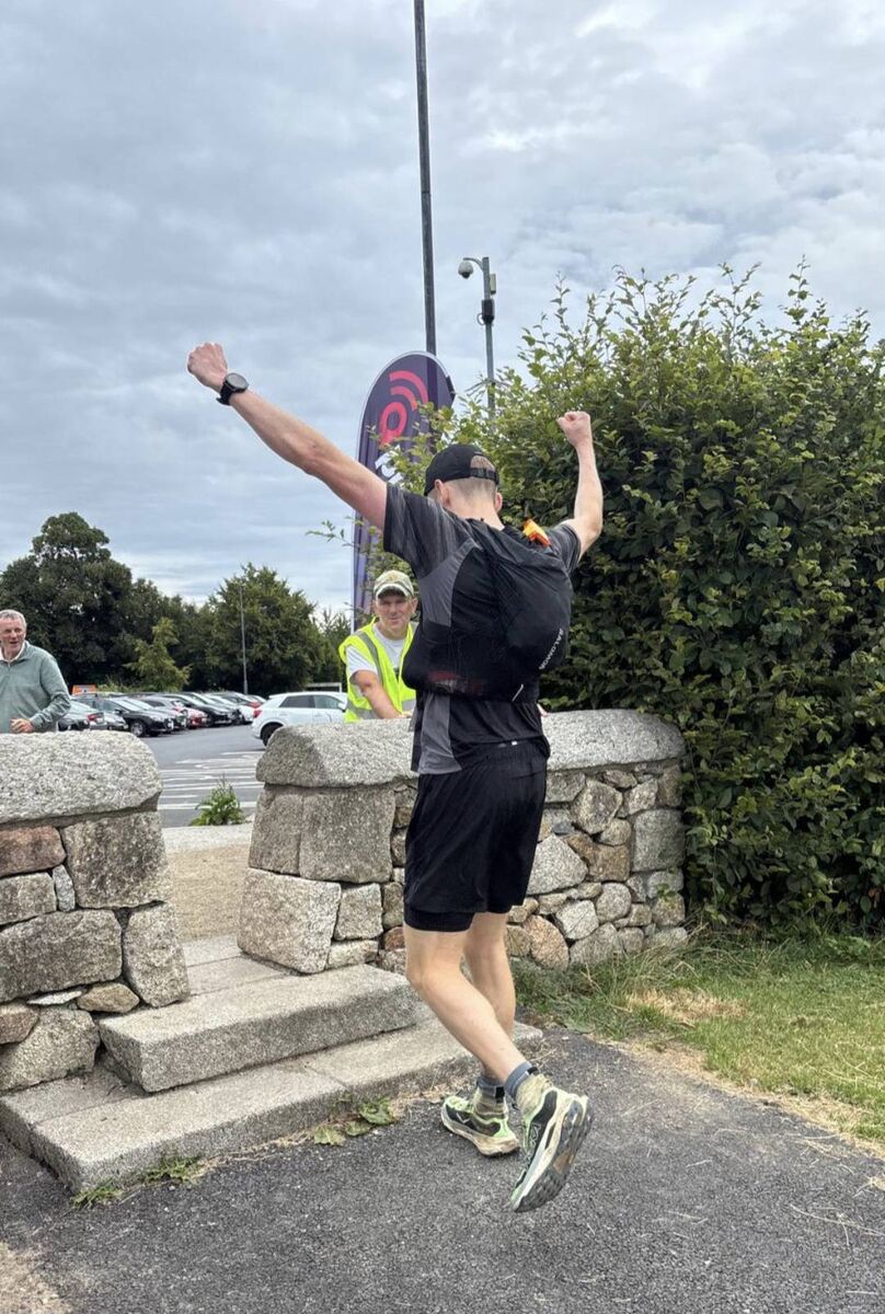 A victorious Cillian Fleming celebrates with his father Paul on the left after winning the IMRA Wicklow Way 130KM and 4300 Km Elevation race in July. A victorious Cillian Fleming celebrates with his father Paul on the left after winning the IMRA Wicklow Way 130KM and 4300 Km Elevation race in July.