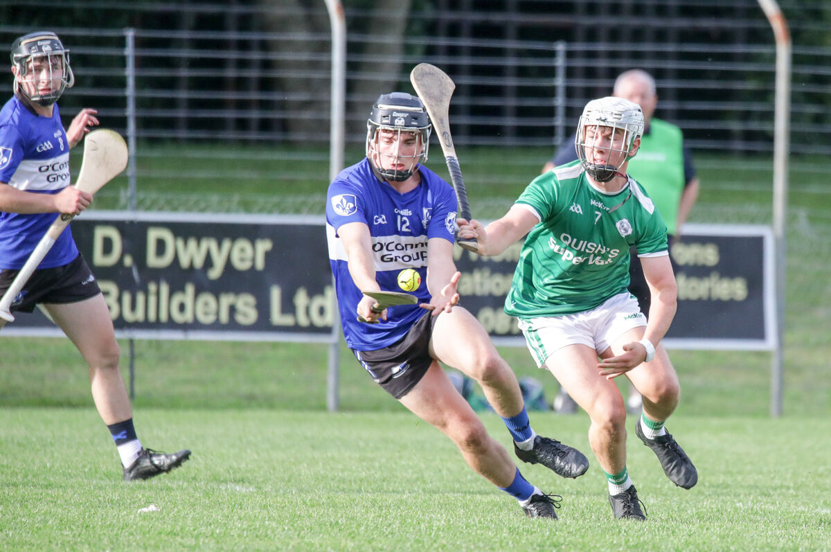 Sars minor hurler Cullen Condon tries to get away from Ballincollig's Cian Ahern. Picture: David Creedon Sars minor hurler Cullen Condon tries to get away from Ballincollig's Cian Ahern. Picture: David Creedon