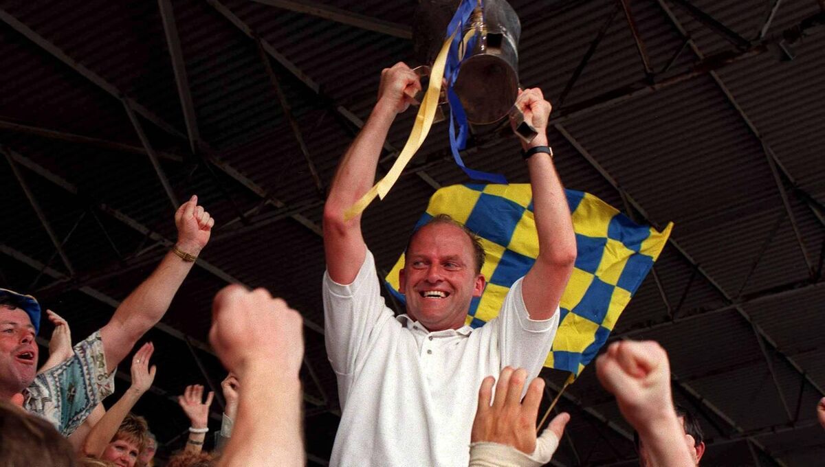 Clare manager Ger Loughnane celebrates with the cup after the 1995 Munster hurling final. Picture: Matt Browne/Sportsfile