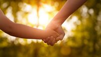 Mother's and a child hands