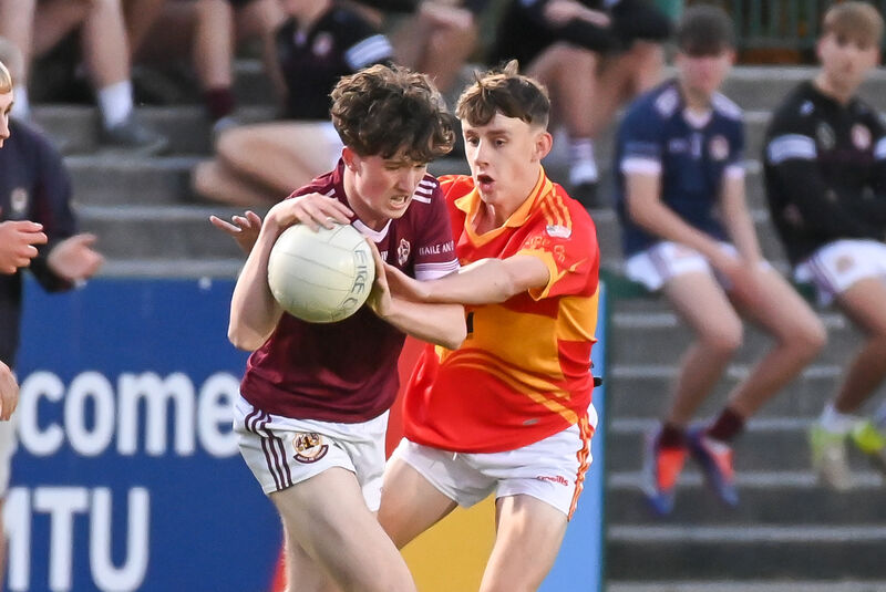 Éire Óg's Cian O'Flynn tackles Bishopstown's Rob Clinton. Picture: David Keane Éire Óg's Cian O'Flynn tackles Bishopstown's Rob Clinton. Picture: David Keane