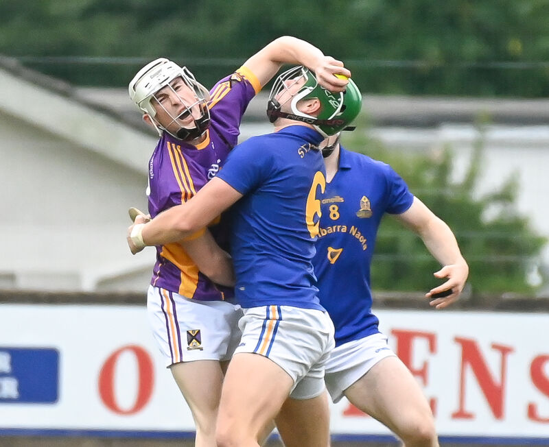  St Catherine's Sean O'Donoghue in a clash with St Finbarr's Luke Hannigan. Picture: David Keane.
