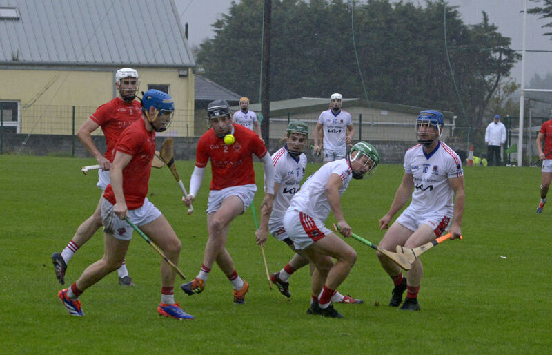  Blarney and Courcey Rovers players fight for the ball. Picture: Denis Boyle