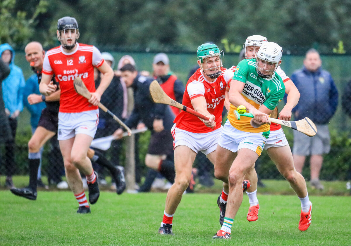 Bride Rovers' Eoin Roche clears the ball before a tackle from Watergrasshill's Adam Murphy. Picture: David Creedon Bride Rovers' Eoin Roche clears the ball before a tackle from Watergrasshill's Adam Murphy. Picture: David Creedon