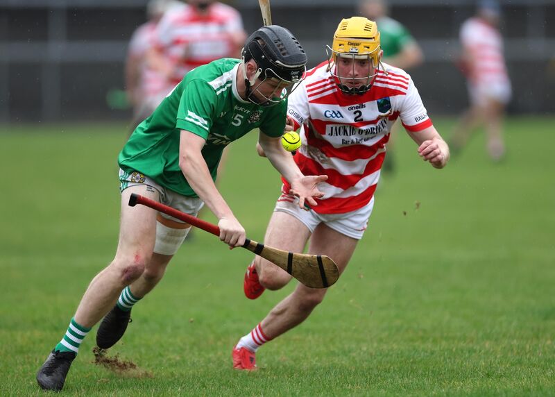 Lorcan Finn, Ballygiblin, tackles Jamie O'Hanlon, Aghada. Picture: Jim Coughlan. Lorcan Finn, Ballygiblin, tackles Jamie O'Hanlon, Aghada. Picture: Jim Coughlan.