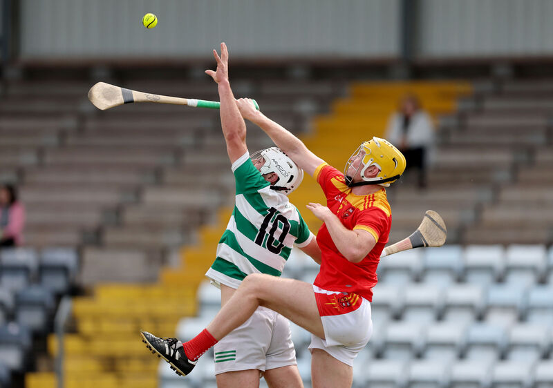 Bill Kingston of Mallow and Adam Kenneally contest possession in the air. Picture: Jim Coughlan Bill Kingston of Mallow and Adam Kenneally contest possession in the air. Picture: Jim Coughlan