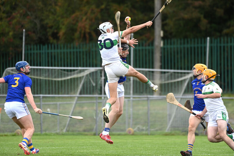 Damien Cahalane makes a catch in the air for St Finbarr's under pressure from Kanturk. Picture Larry Cummins Damien Cahalane makes a catch in the air for St Finbarr's under pressure from Kanturk. Picture Larry Cummins