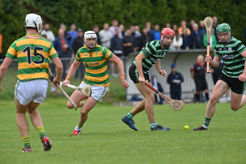 Blackrock players Niall Cashman and Robbie Cotter fighting for this breaking ball with Douglas players Brian O'Neill and Brian O'Connor. Picture: Dan Linehan Blackrock players Niall Cashman and Robbie Cotter fighting for this breaking ball with Douglas players Brian O'Neill and Brian O'Connor. Picture: Dan Linehan