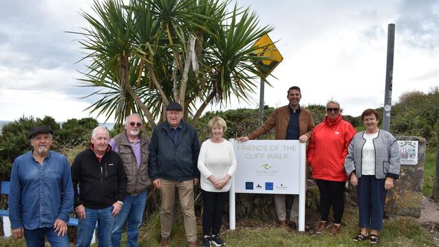 <p>Ballycotton Cliff Walk fundraising committee with the ‘Friends of the Cliff Walk’ Sign, (l to r): Maurice Whelan, John Archer, Bill O’Leary, Jerry Lynch, Maryrose Lynch, Oliver Falter, Niamh McNamara, Jo Archer</p>