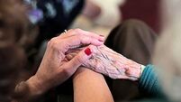 A member of staff and a resident at a care home in County Durham, UK. 16/6/2017. Photograph: Stuart Boulton.