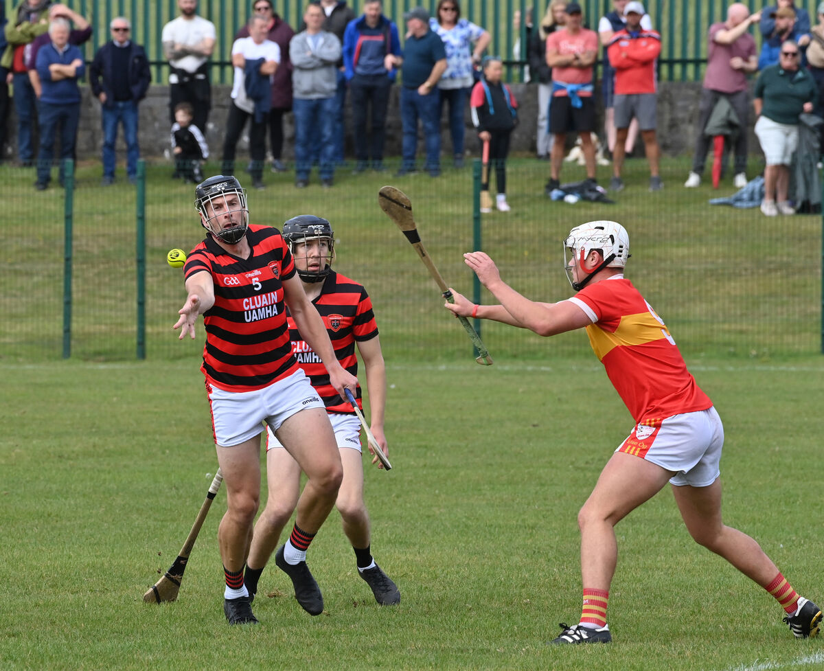 Eoin Motherway, Cloyne, getting his pass away watched by Johnny Galvin of Éire Óg. Picture: Dan Linehan Eoin Motherway, Cloyne, getting his pass away watched by Johnny Galvin of Éire Óg. Picture: Dan Linehan