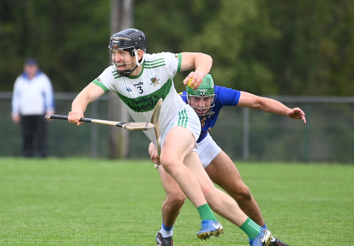 Mark Healy, Kanturk, gets past a challenge from Ben Cunningham, St Finbarr's. Picture: Larry Cummins Mark Healy, Kanturk, gets past a challenge from Ben Cunningham, St Finbarr's. Picture: Larry Cummins