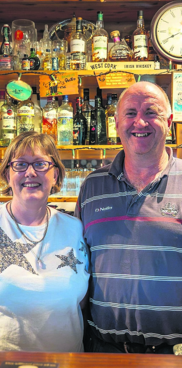 Marie and Dennis O’Donovan in their pub in Castlefreke, near Clonakilty. Their two teenage sons also help out behind the bar. Picture: Noel Sweeney Marie and Dennis O’Donovan in their pub in Castlefreke, near Clonakilty. Their two teenage sons also help out behind the bar. Picture: Noel Sweeney