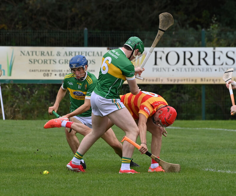  Robert Troy and Cormac O'Brien of Newtownshandrum fighting for this breaking ball with Richard O'Sullivan of Newcestown. Picture: Dan Linehan