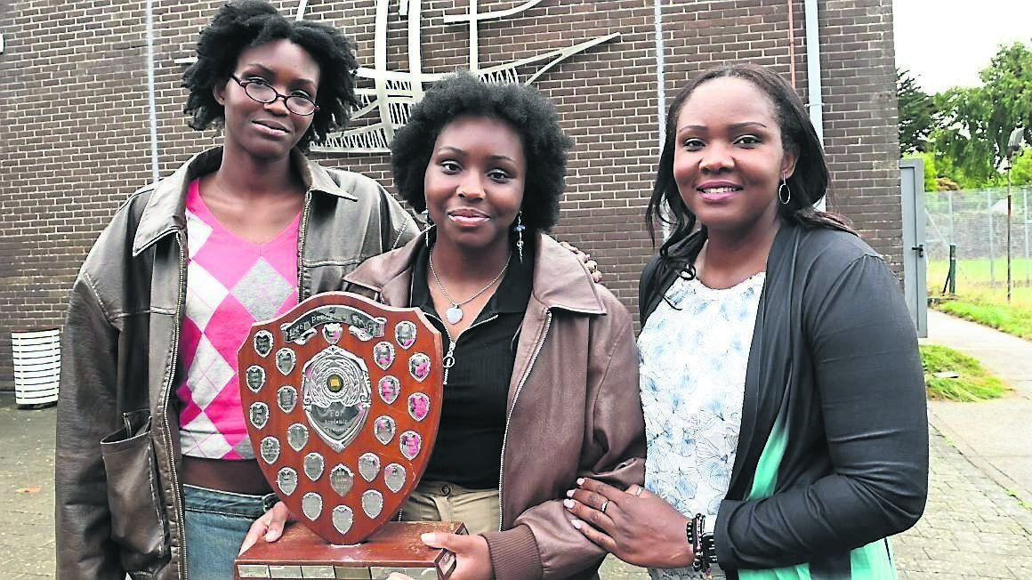 Stefany Ibebugwu with the Pfizer Perpetual Trophy for the highest CAO points achieved by a Leaving Certificate student at Ashton School, pictured with her sister Christabell and mother Obianuju. Picture: Larry Cummins
Stefany Ibebugwu with the Pfizer Perpetual Trophy for the highest CAO points achieved by a Leaving Certificate student at Ashton School, pictured with her sister Christabell and mother Obianuju. Picture: Larry Cummins