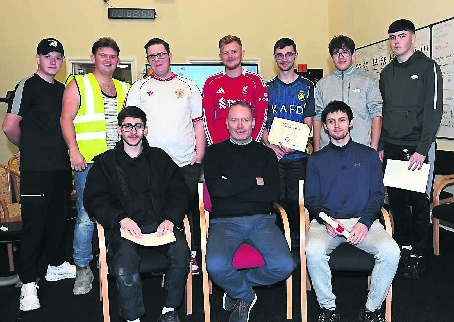 Construction skills instructor Alan Buckley (front centre), with students Adam Barrett, Kai Jackson, Ryan Brierley, John Corcoran, Rory Connolly, Brandon Duggan, Alan Buckley, Sean Kelly, and Kalvin Blake at the awards presentation ceremony. Construction skills instructor Alan Buckley (front centre), with students Adam Barrett, Kai Jackson, Ryan Brierley, John Corcoran, Rory Connolly, Brandon Duggan, Alan Buckley, Sean Kelly, and Kalvin Blake at the awards presentation ceremony.