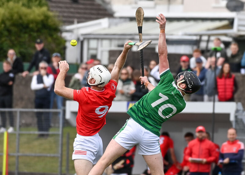  Castlemartyr's Brian Lawton and Ballincollig's Cian Dorgan compete in the air during their Premier IHC clash at Carrigtwohill. Picture: David Keane.