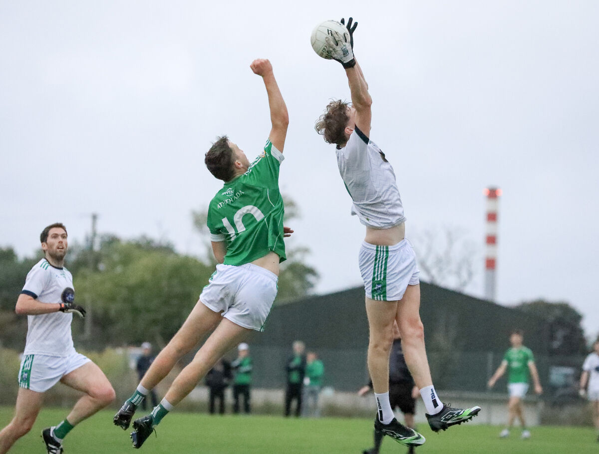 Ilen Rovers' Micheál Sheehy rises for the ball over Aghada's Diarmuid Byrne last season. Picture: David Creedon