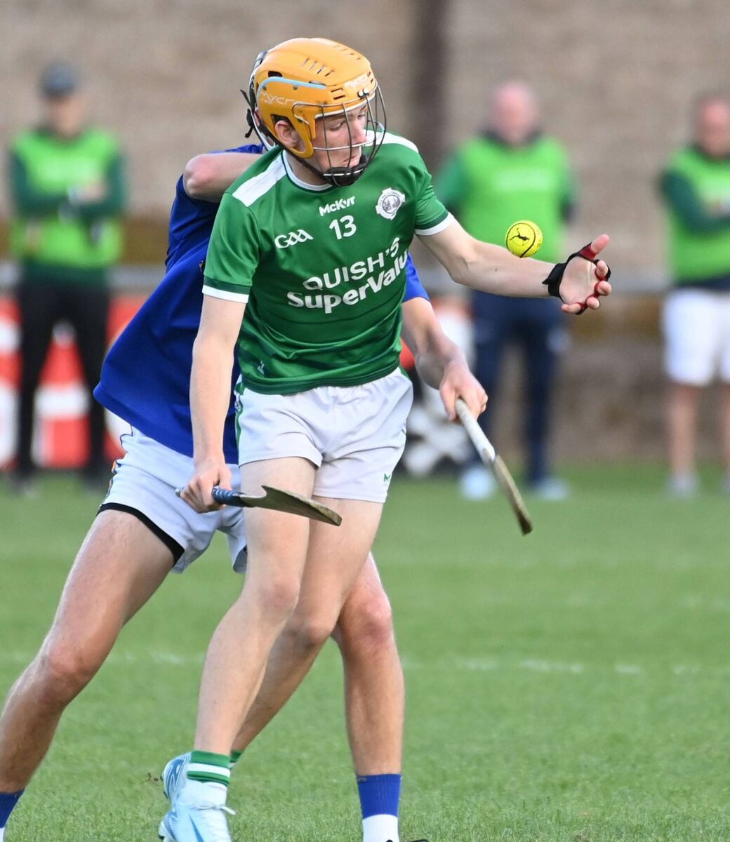 Ballincollig's Daithí Murphy grabs the sliotar ahead of St Finbarr's Liam O'Regan. Picture: Eddie O'Hare