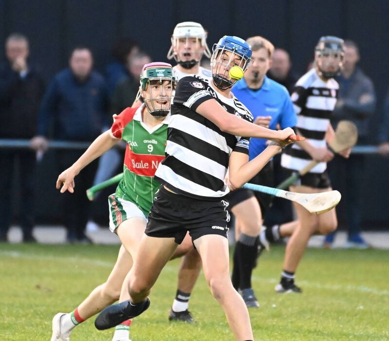 Midleton's Charlie McCarthy shoots from Ballinora's Denis O'Mahony. Picture; Eddie O'Hare Midleton's Charlie McCarthy shoots from Ballinora's Denis O'Mahony. Picture; Eddie O'Hare