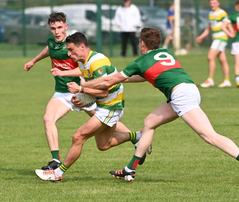 Carbery Rangers' John O'Rourke is tackled by Clonakilty's Griffin Wharton last year. The West Cork rivals face each other on Sunday, seeking to avoid the relegation play-off. Picture: Eddie O'Hare