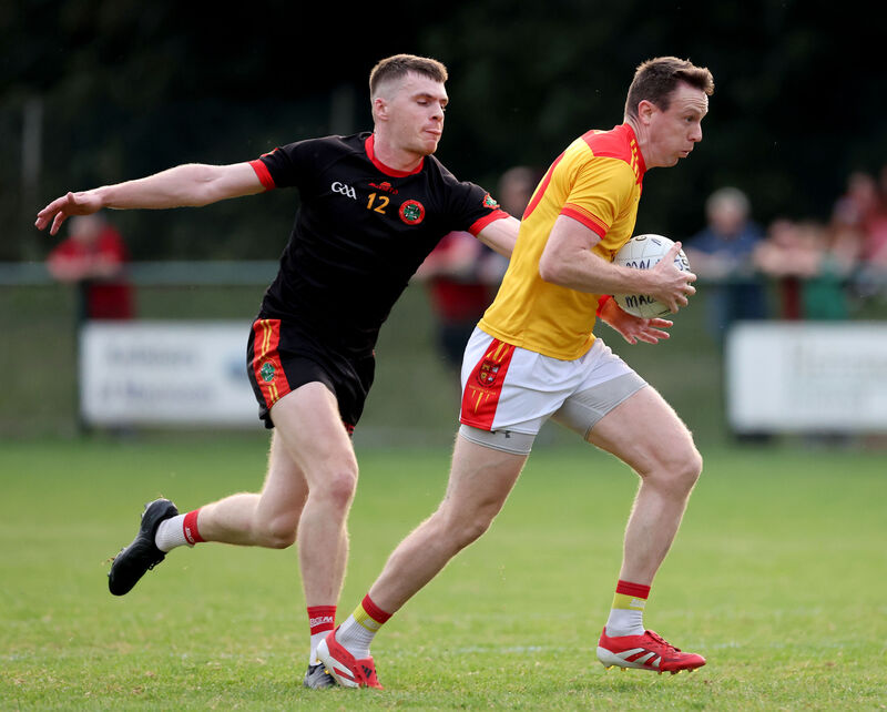  David Buckley of Newcestown chases Mallow's Michael O'Rourke. Newcestown will face Castlehaven, seeking to top their group, while Mallow take on Valley Rovers hoping to secure safety. Picture: Jim Coughlan