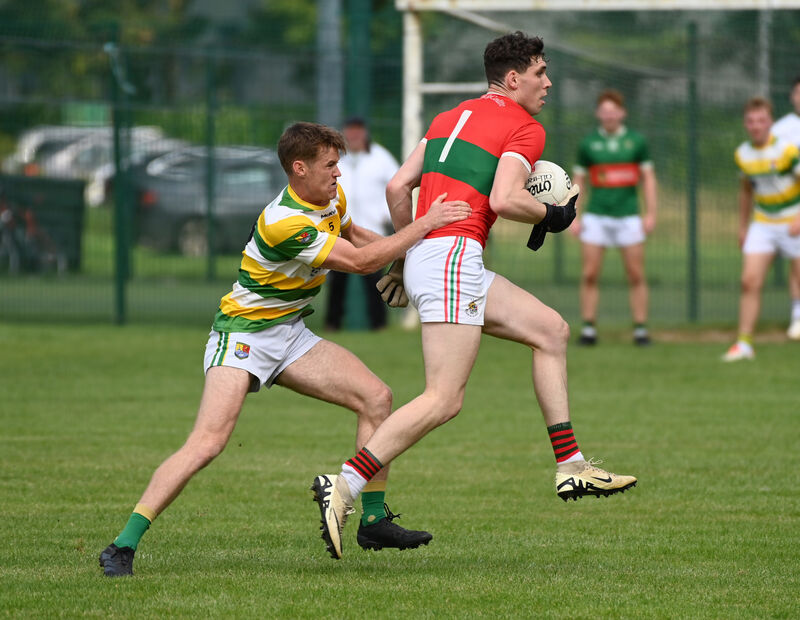 Clonakilty goalkeeper Mark White breaking up field past Carbery Rangers' Jerry O'Riordan. Picture: Eddie O'Hare