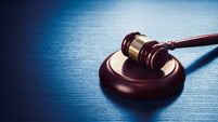 judge gavel on a blue wooden background