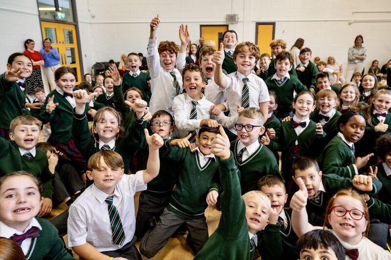 Students at Gaelscoil an Ghoirt Álainn erupt in celebration after Lord Mayor of Cork councillor Fergal Dennehy announces a night off homework during his annual visit to primary schools in Cork city. Picture Chani Anderson