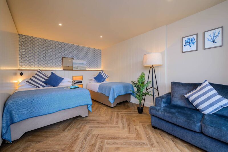 Designed with families in mind, the two-bedroom Family Suites offer space and comfort for families after a busy day exploring Kerry. 