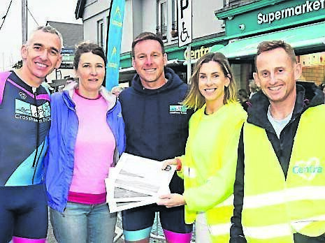 Overall Crosshaven Triathlon relay team winners - ‘Tri Really Hard’ - Mark Pinfield, Jenny Powell and Conor McCarthy, being presented with their prizes by Jenny and Alex Barry, of Barrys Centra.	 Picture: Siobhán Russell
                    