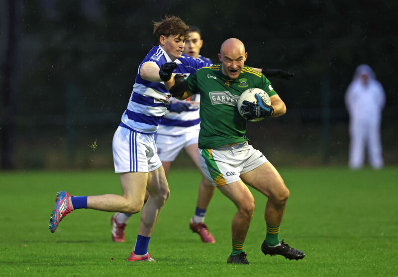  Noah Ryan of Kinsale puts the pressure on Adam McCarthy of Cobh. Picture: Jim Coughlan