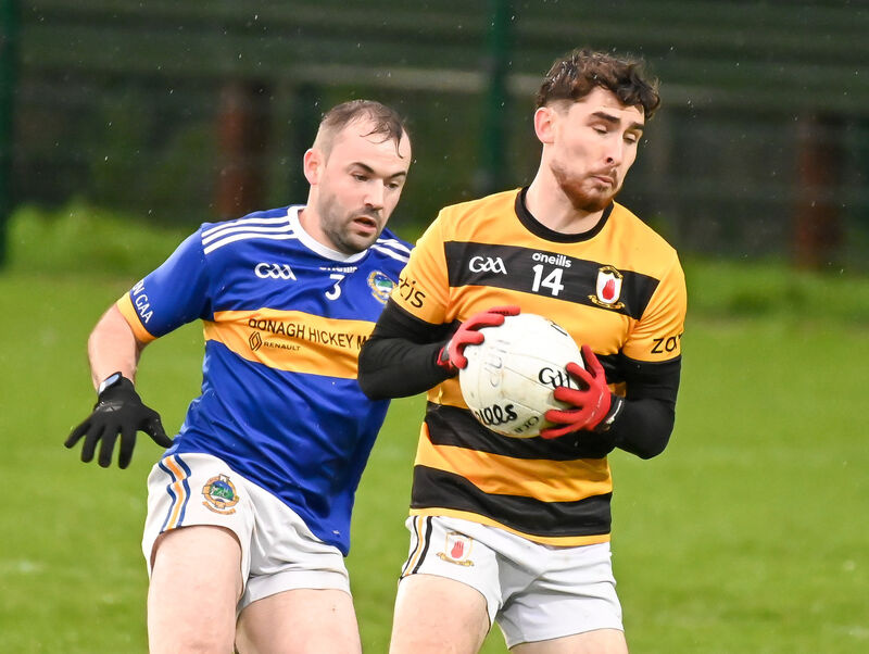 Na Piarsaigh's Sean Downey wins possession ahead of Cullen's Darragh Twomey during their Premier JFC clash at Glantane. Na Piarsaigh's Sean Downey wins possession ahead of Cullen's Darragh Twomey during their Premier JFC clash at Glantane.