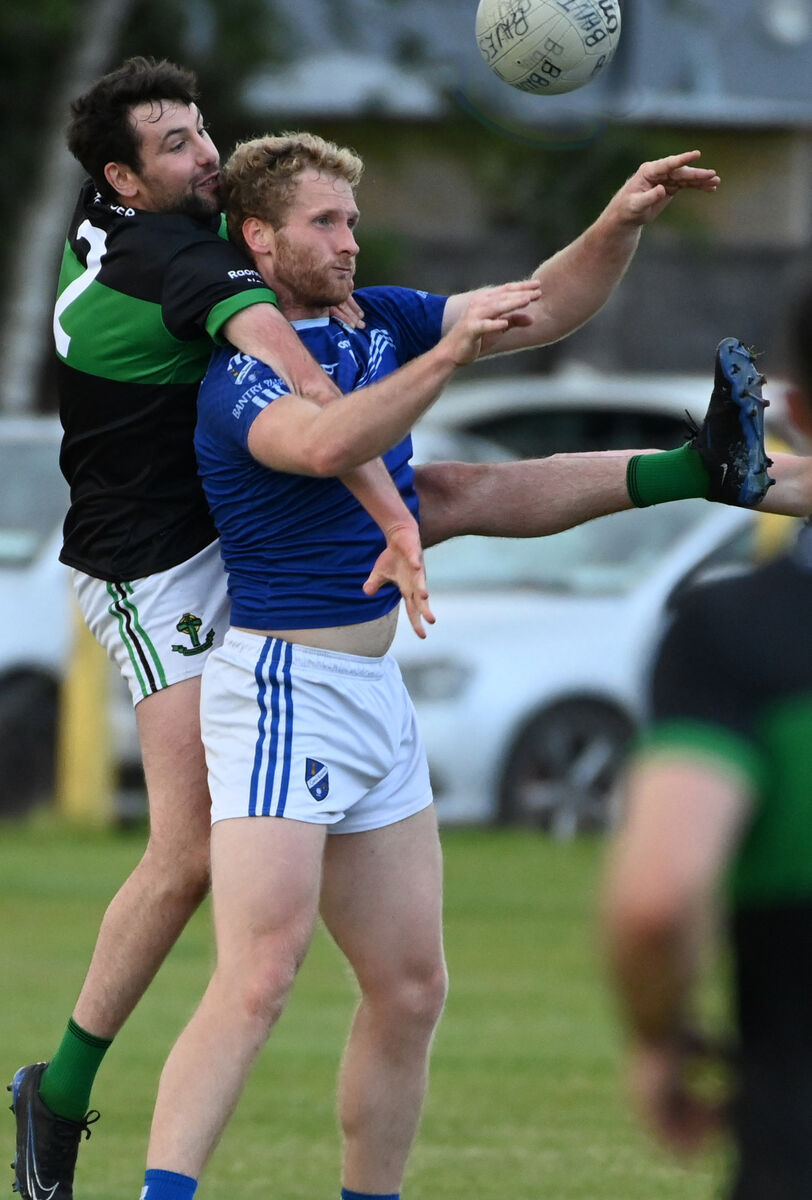 Bantry Blues' Ruairí Deane is challenged by Nemo Rangers' Andrew McGowan. Picture: Eddie O'Hare