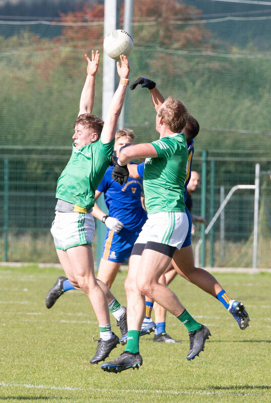 Glanworth's Stephen Condon and Dave Pyne rise high with St Finbarr's Matthew Ahern. Picture: Howard Crowdy Glanworth's Stephen Condon and Dave Pyne rise high with St Finbarr's Matthew Ahern. Picture: Howard Crowdy