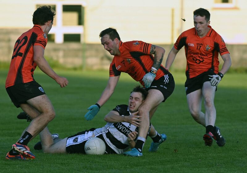 Kiskeam's Kieran O'Connor tackles Castletownbere's Joe O'Neill. Picture: Eddie O'Hare