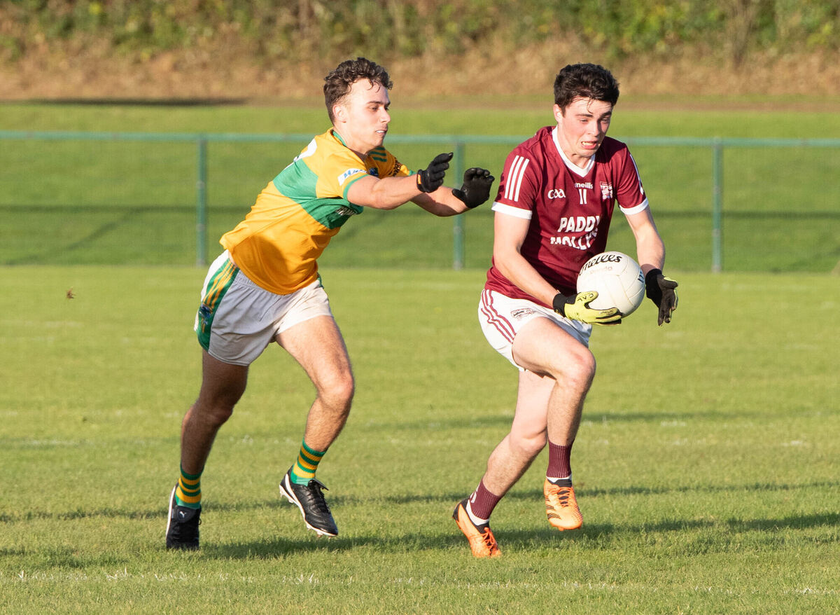 Rockchapel's Ciaran Curtin pulls away from Glanmire's Daniel Molden. Picture: Howard Crowdy
