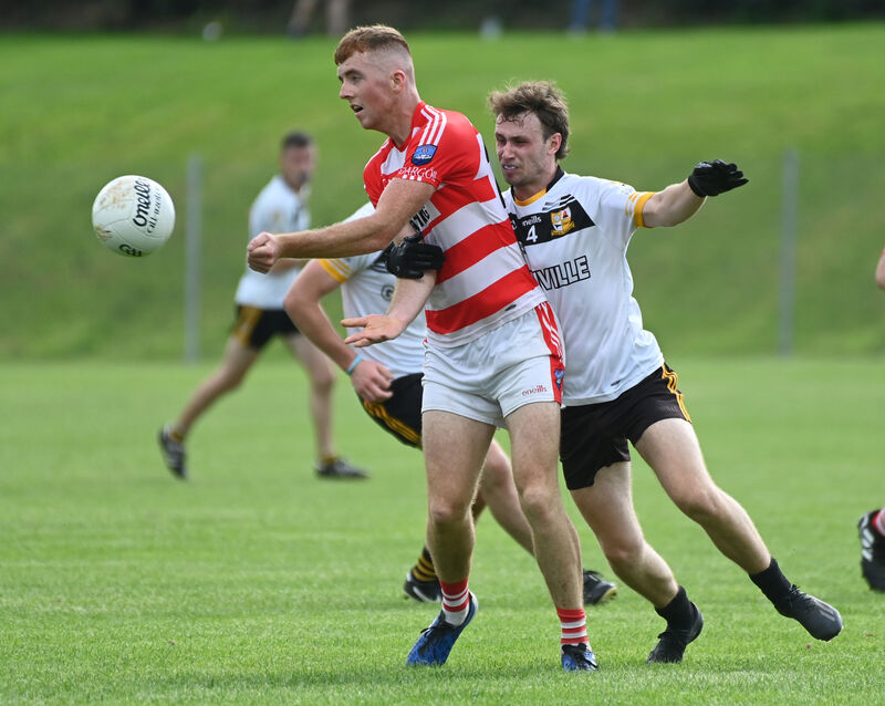 Adrigole's Neil O'Sullivan gets off his pass from Glenville's Shane O'Reilly in 2023. Picture: Eddie O'Hare Adrigole's Neil O'Sullivan gets off his pass from Glenville's Shane O'Reilly in 2023. Picture: Eddie O'Hare