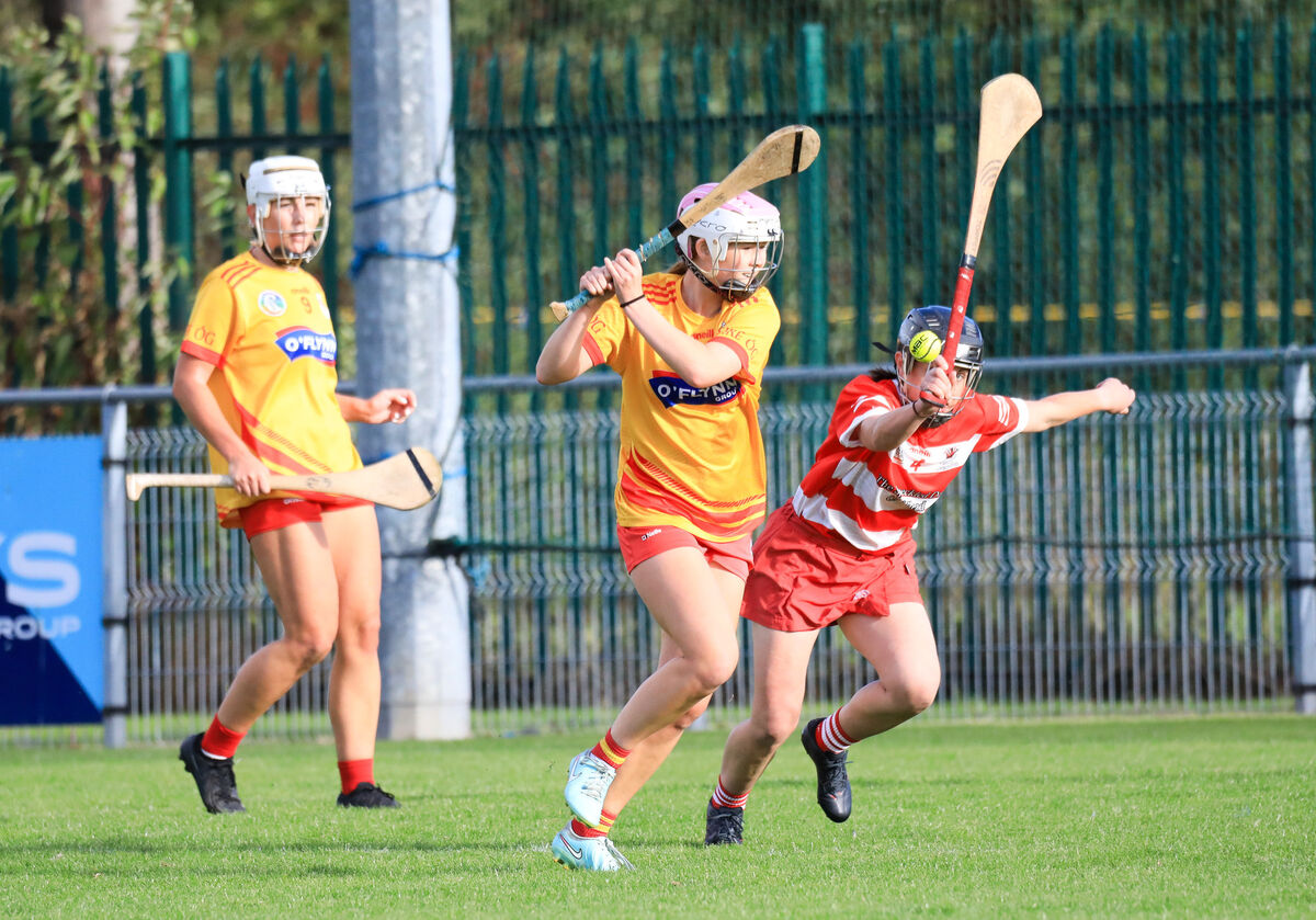 Éire Óg's Erin Healy clears from Courcey Rovers' Orla Twomey at Castle Road. Picture: David Creedon Éire Óg's Erin Healy clears from Courcey Rovers' Orla Twomey at Castle Road. Picture: David Creedon