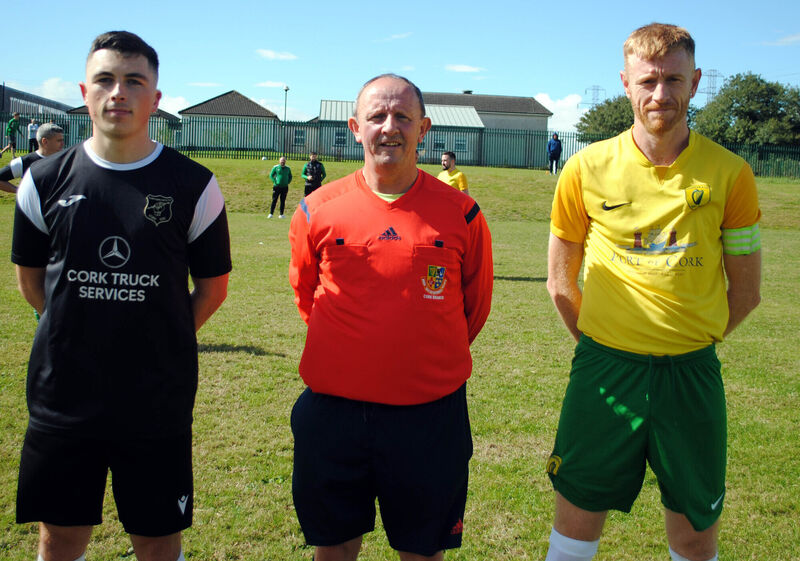 Glenthorn Celtic's Jamie Keniry (left), with Hibernians' Brian Stack, accompanied by referee Paul Bowdren.
