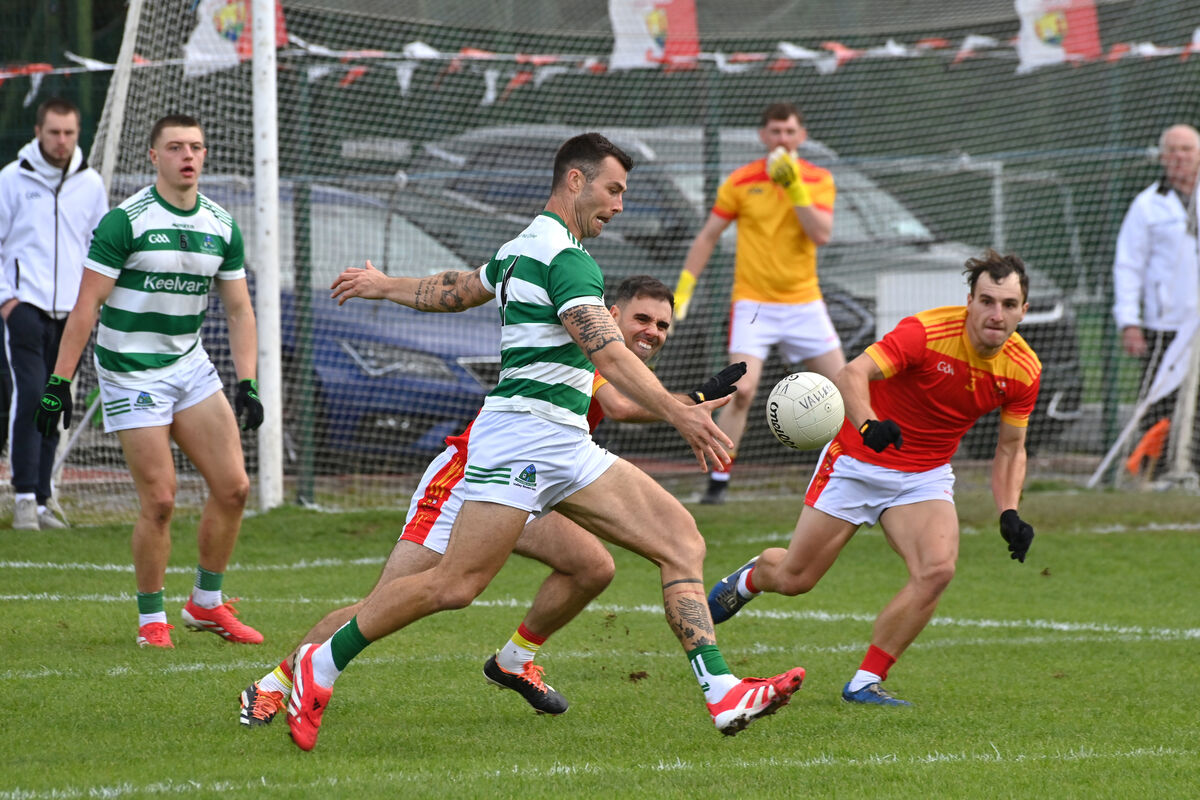 Fiachra Lynch, Valley Rovers, about to score a point as Mallow players Bill Myers and Paul Lyons try to block him down. Picture: Dan Linehan Fiachra Lynch, Valley Rovers, about to score a point as Mallow players Bill Myers and Paul Lyons try to block him down. Picture: Dan Linehan
