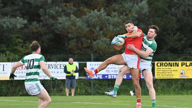 <p> Shane Merritt, Mallow, jumping for this high ball with Chris O'Leary, Valley Rovers, in their McCarthy Insurance Group Premier SFC match at Blarney. Picture: Dan Linehan</p>