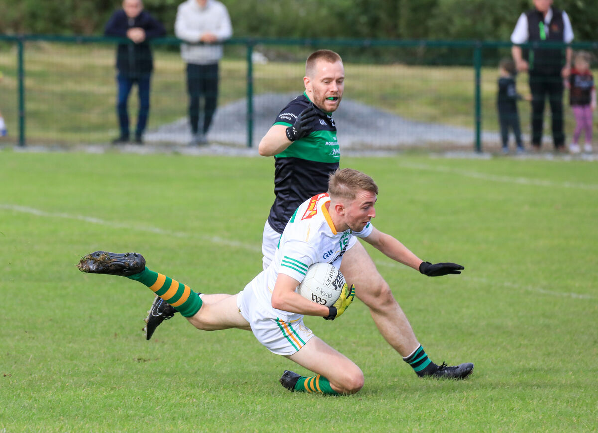 St Michael's Adam Hennessy goes to ground while being tackled by Nemo's Alan O'Donovan. Picture: David Creedon St Michael's Adam Hennessy goes to ground while being tackled by Nemo's Alan O'Donovan. Picture: David Creedon