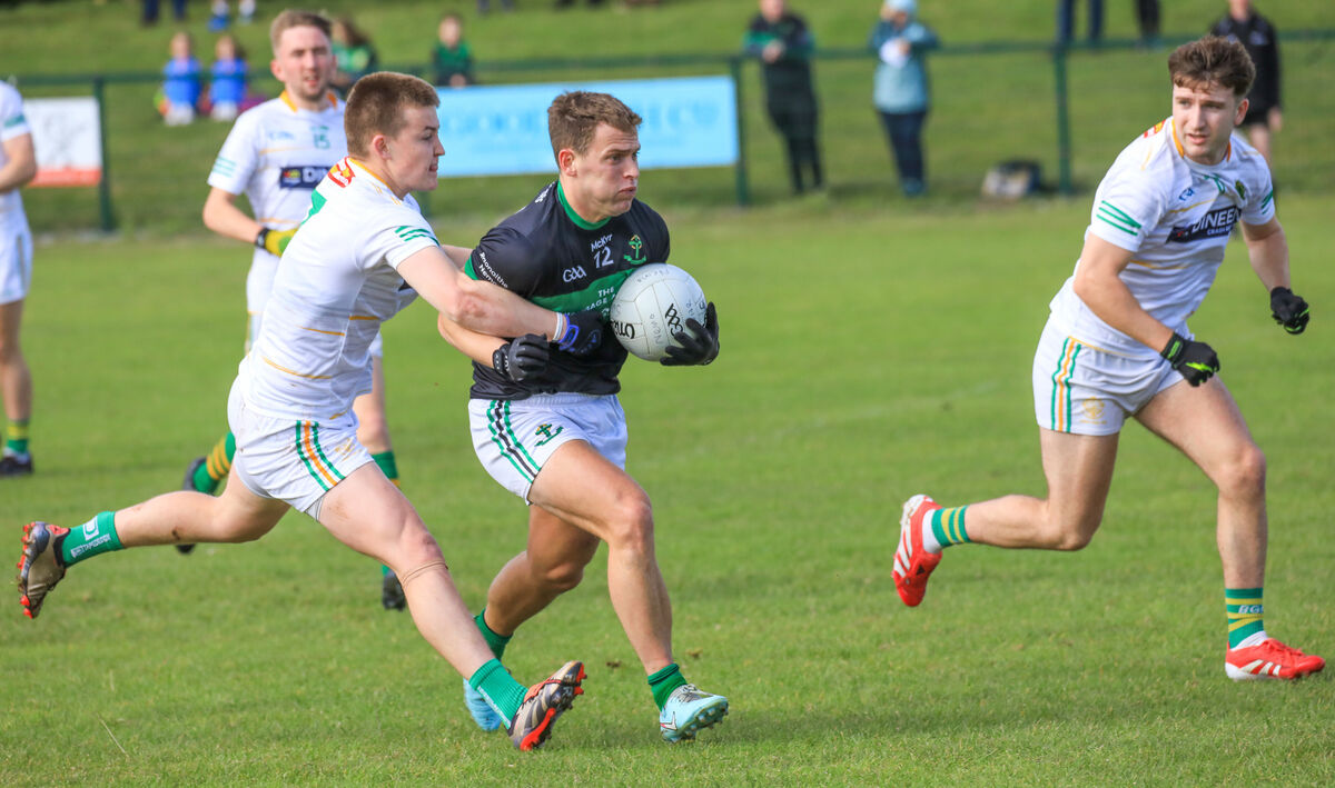 Nemo's Kevin O'Donovan tries to get away from St Michael's Fionnán Leahy. Picture: David Creedon Nemo's Kevin O'Donovan tries to get away from St Michael's Fionnán Leahy. Picture: David Creedon