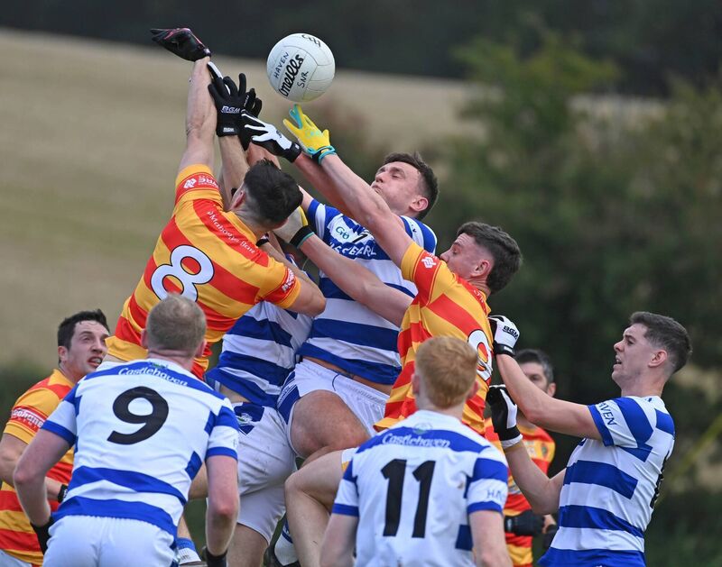Castlehaven's Mark Collins goes high with Newcestown's Sean O'Donovan and Eoghan Collins during the McCarthy Insurance Group Premier SFC at Rossmore. Picture: Eddie O'Hare Castlehaven's Mark Collins goes high with Newcestown's Sean O'Donovan and Eoghan Collins during the McCarthy Insurance Group Premier SFC at Rossmore. Picture: Eddie O'Hare